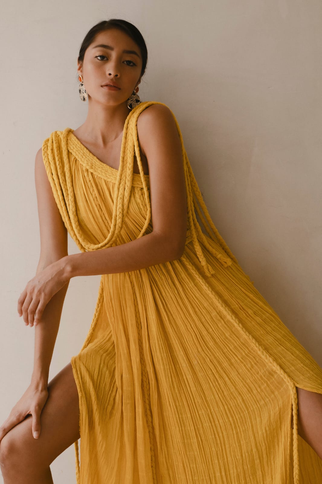mustard yellow Grecian-style maxi dress with a soft, flowy, and ethereal silhouette.
