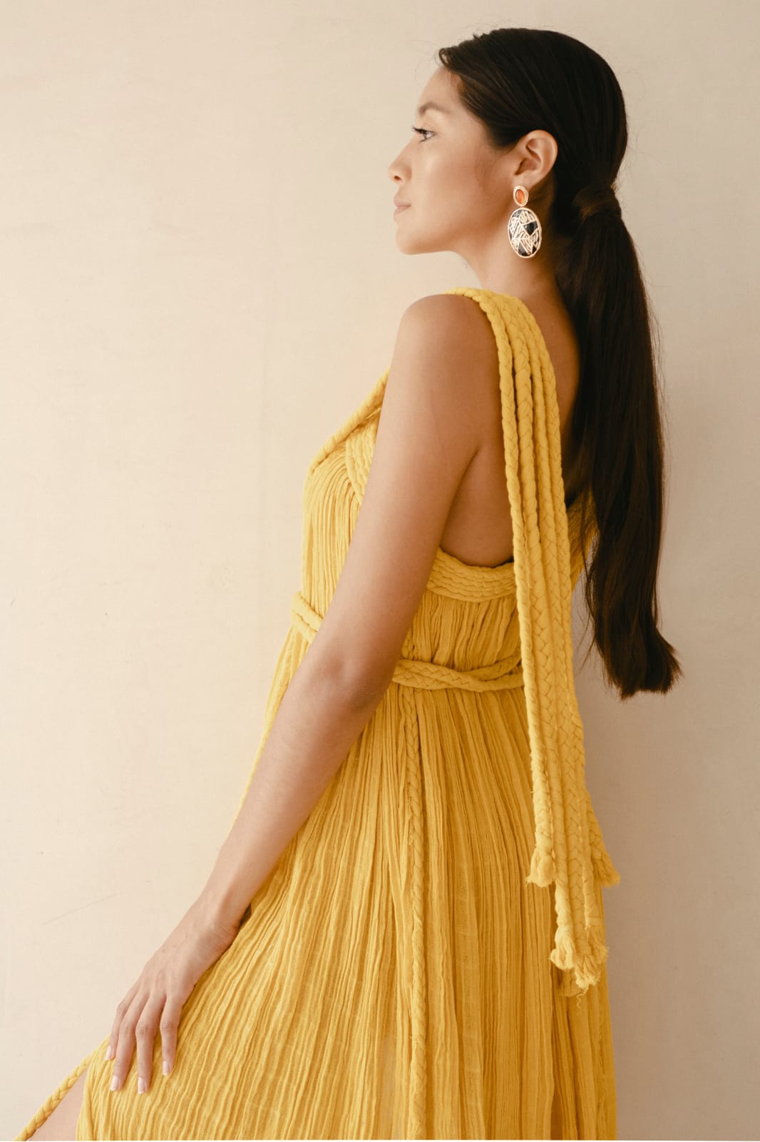 mustard yellow Grecian-style maxi dress with a soft, flowy, and ethereal silhouette.