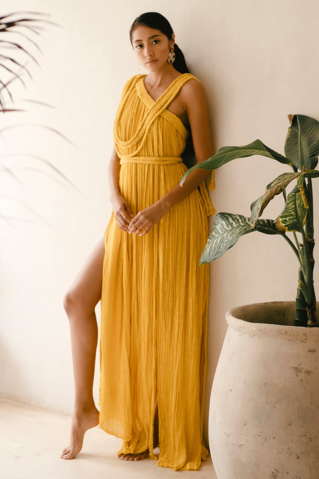 mustard yellow Grecian-style maxi dress with a soft, flowy, and ethereal silhouette.