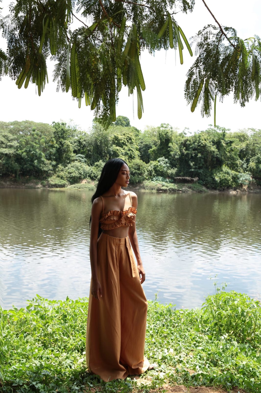 chic two-piece co-ord set in a warm caramel or camel brown shade, blending softness with subtle drama for a relaxed yet fashion-forward aesthetic.