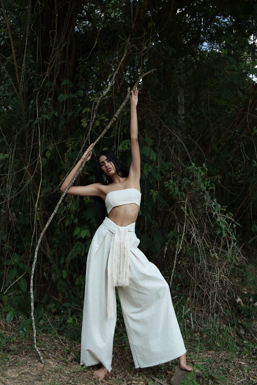 minimalist, boho-inspired two-piece co-ord set in a soft off-white or natural beige tone, perfect for warm-weather styling with a raw, earthy elegance.