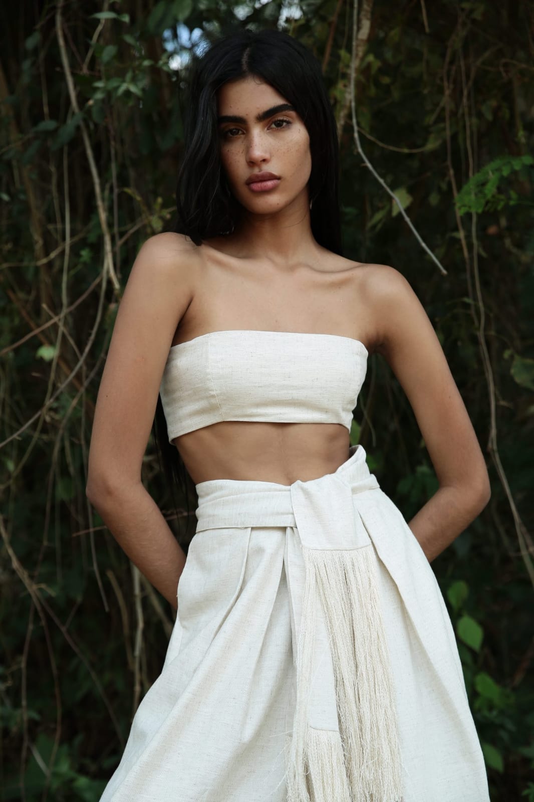 minimalist, boho-inspired two-piece co-ord set in a soft off-white or natural beige tone, perfect for warm-weather styling with a raw, earthy elegance.