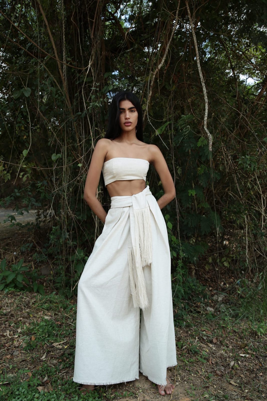 minimalist, boho-inspired two-piece co-ord set in a soft off-white or natural beige tone, perfect for warm-weather styling with a raw, earthy elegance.